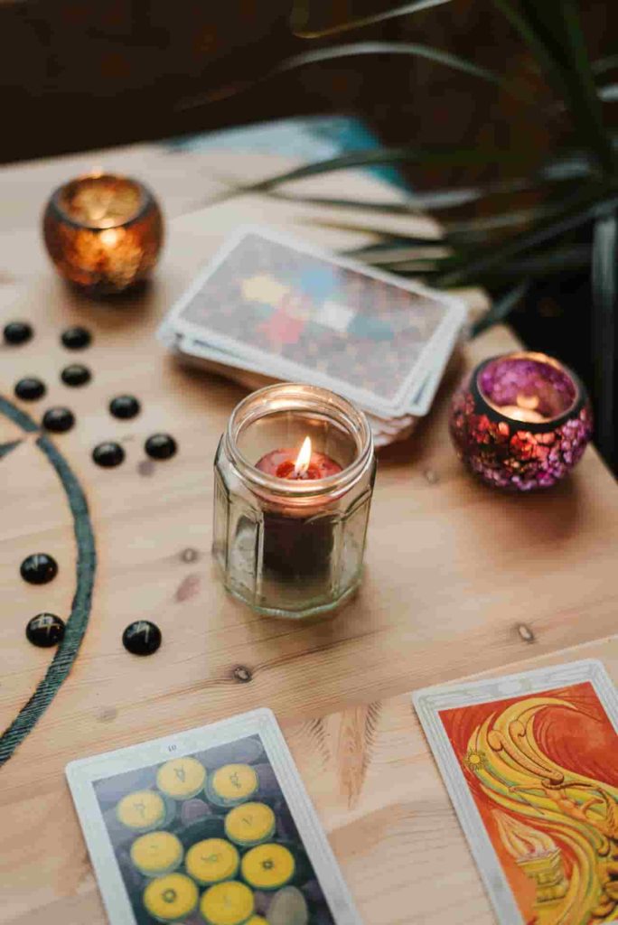 tarot cards with candles
