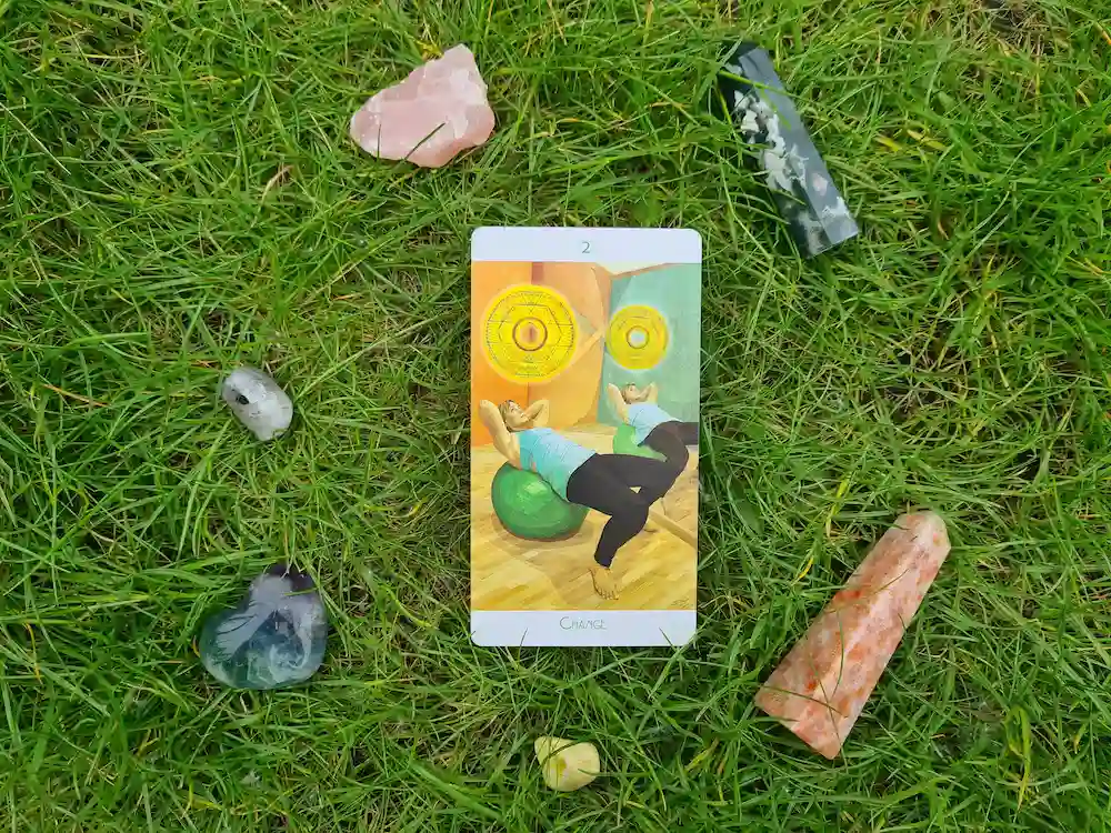 upright two of pentacles